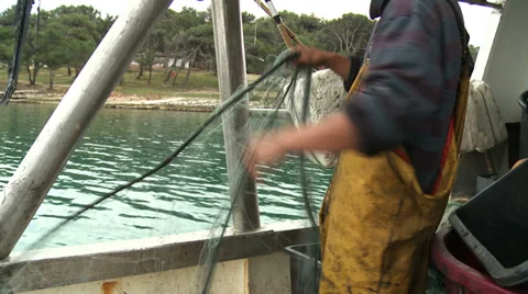 Fishermen cleaning nets 8 Stock-Footage 31276369