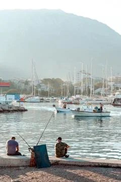 Fishermen at dawn Stock Photos