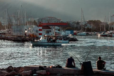 Fishermen at dawn Stock Photos