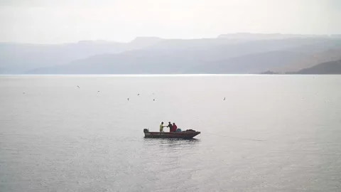 Fishermen in the dead sea Stock Footage 303400167