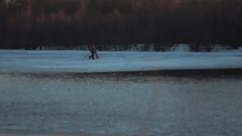 Fishermen on ice,  river, branches 스톡 동영상 170254989