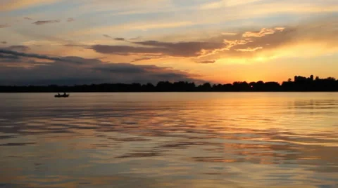 Fishermen on Lake with Sunset Stock Footage 29800844