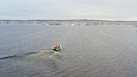 Fishermen Navigating Fish Farm Cages. Aerial drone shot Stock Footage 274344829