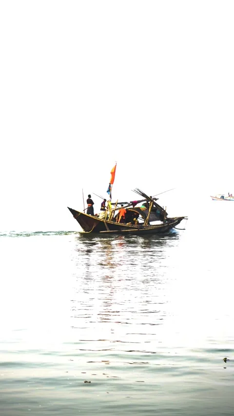 Fishermen navigating wooden trawler Video stock 345154398