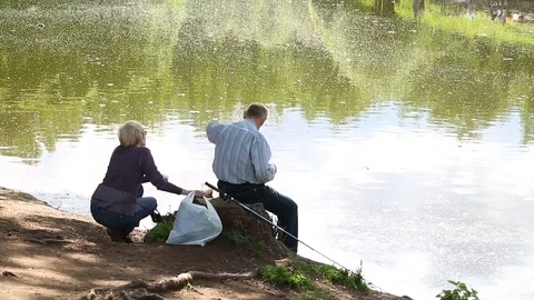 Fishermen on the pond Stock Footage 77017692