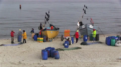 Fishermen prepare their nets to catch fish, Baltic Sea, Poland Stock Footage 32594294