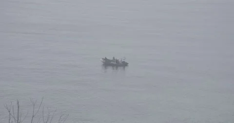 Fishermen Preparing on Inflatable Boat at Sea – 4K Ungraded Stock Footage 320105847