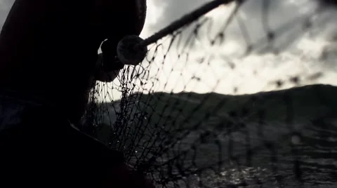 Fishermen pulling net at sea Stock Footage 68084069