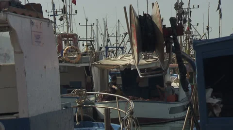 Fishermen rearranging nets  Stock Footage 37809454