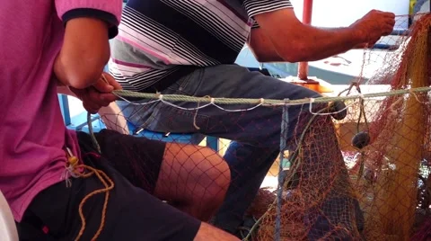 Fisherman Repairs Fishnets and Fishing Lines - Free HD Video Clips