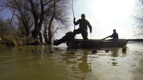Fishermen on the river put the network Stock Footage 51973702