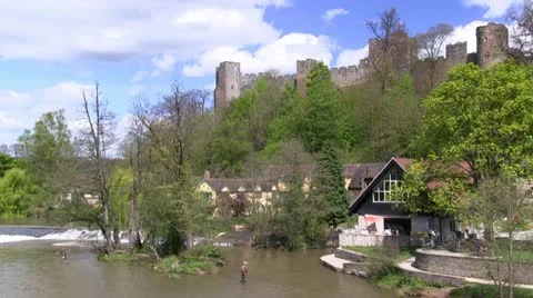 Fishermen in River Teme by Ludlow Castle, Shropshire Stock-Footage 11152913