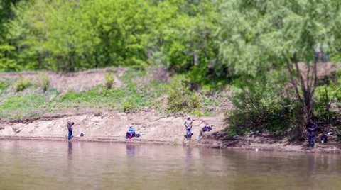 Fishermen on the river. Time lapse Stock Footage 10947261