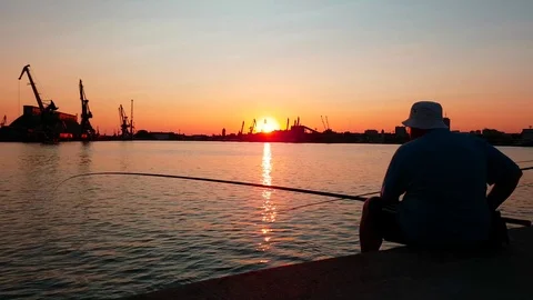 Fishermen at the seaport Stock Footage 76965337