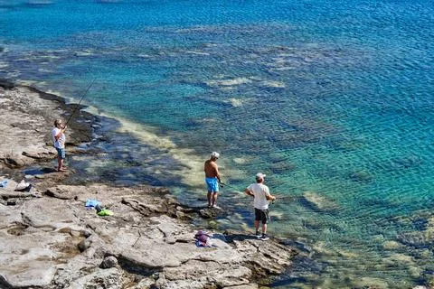 Fishermen on the seashore 스톡 사진