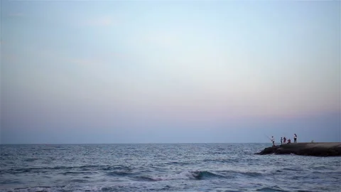 Fishermen on the seashore in slow motion. Stock Footage 153911516