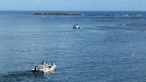 Fishermen in a Small Boat Stock Footage 129511965