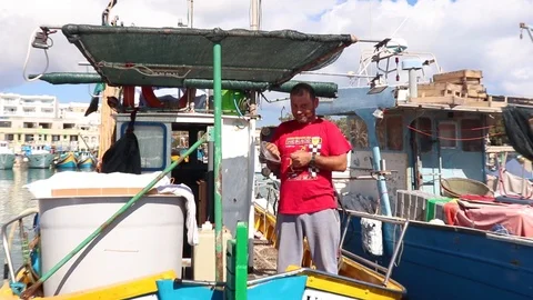 Fishermen Sort Out The Nets And Gear Preparing For Fishing Stock Footage 99686016