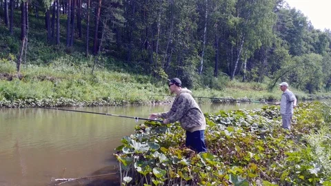 Fishermen stand on the shore Stock-Footage 80169673