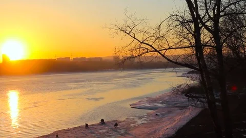 Fishermen at sunset in winter Stock Footage 74061589
