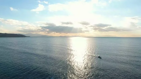 Fishermen throwing net into the sea at sunset 4K Drone Shot-4 Stock Footage 146694429