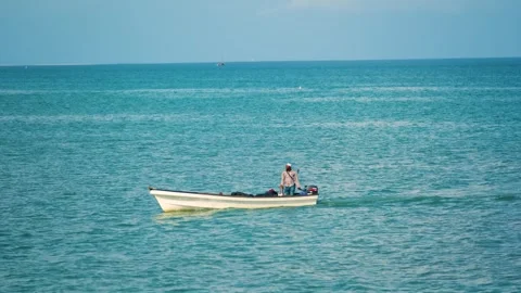 Fishermen Trying to Catch Fish Along the Shore at Low Tide, January 21, 2025, Video stock 336896536