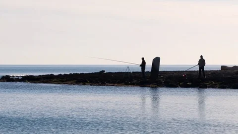 Fishermen waiting Stock Footage 105324664