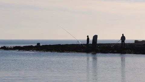 Fishermen waiting Stock Footage 105325292