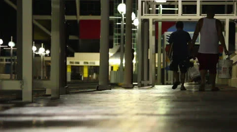 Fishermen walking down famous St. Petersburg pier with gear Stock Footage 26148917