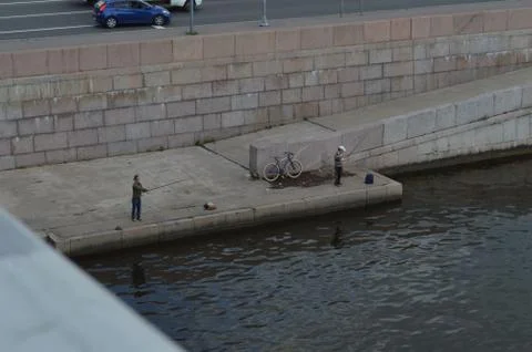 Fishermen on the waterfront Stock Photos