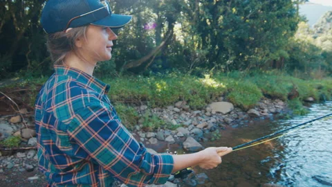 Woman Fishing Stock Footage ~ Royalty Free Stock Videos