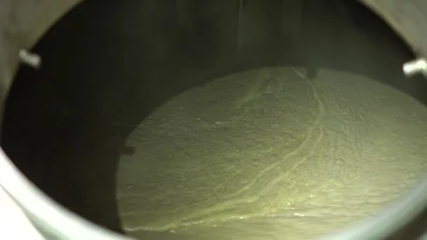 Fishery industry: a fish slurry machine, designed to process fish into a 動画素材 257916876