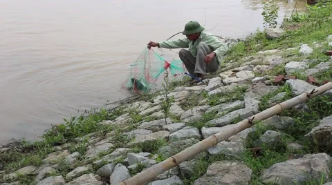 Fishing areas, men sit riverside fishing Stock-Footage 58201565