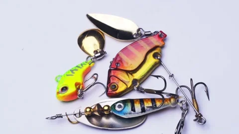 Fishing baubles revolve close-up. artificial bait for kids Stock Footage 220317714