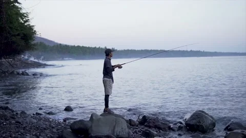 Fishing on the beach Stock Footage 143128184