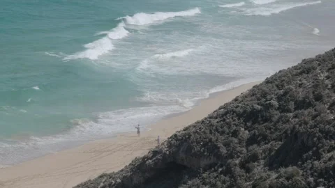 Fishing on beach Stock Footage 245592991