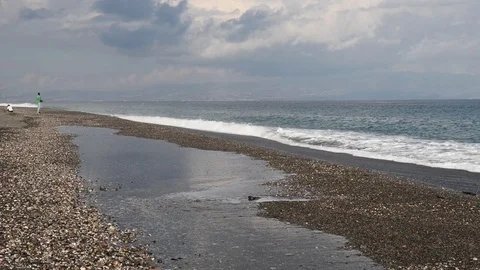Fishing on the beach where waves break Stock Footage 83221452
