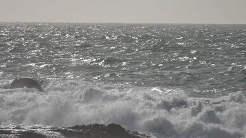 Fishing boat across the screen in a rough sea Stock Footage