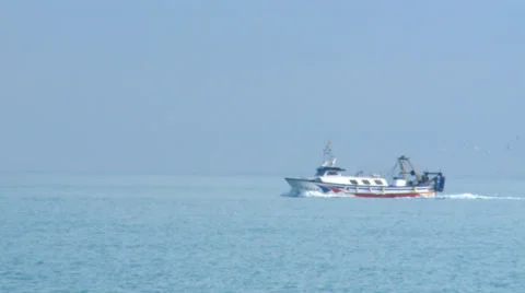 Fishing boat advancing to the left Stock Footage 37242897