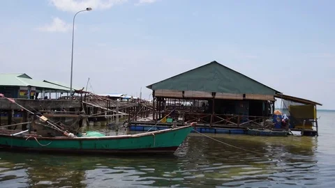 Fishing Boat and floating small restaurant in, Phu Quoc island, Viet Nam. Stock Footage 76664902