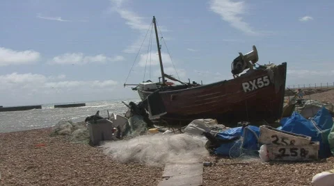 Fishing boat on a beach Stock Footage 490839