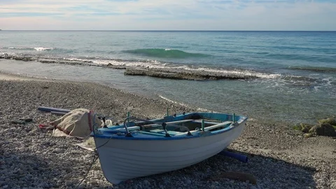 A fishing boat on the beach Stock Footage 109150211