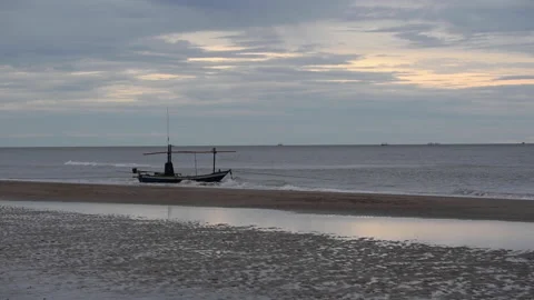 Fishing boat on the beach Stock Footage 136748560