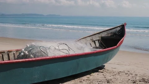 Fishing boat on the beach Stock Footage 138067665