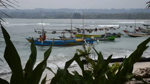 Fishing boat at the beach Stock Footage 192833189