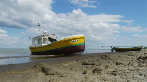 Fishing Boat On The Beach - Timelapse Video stock 132215904