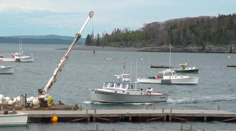 Fishing Boat Docking with Crane Stock Footage