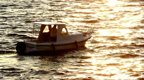 Fishing boat during sunset Stock Footage 12239904