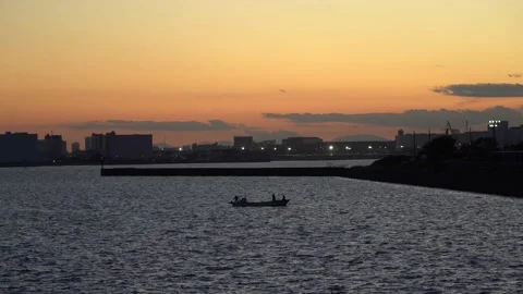 Fishing boat at dusk Stock Footage 141978437