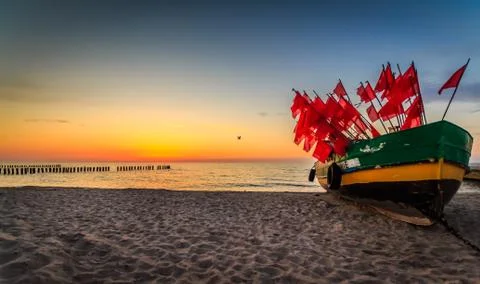 Fishing boat with flags Stock Photos